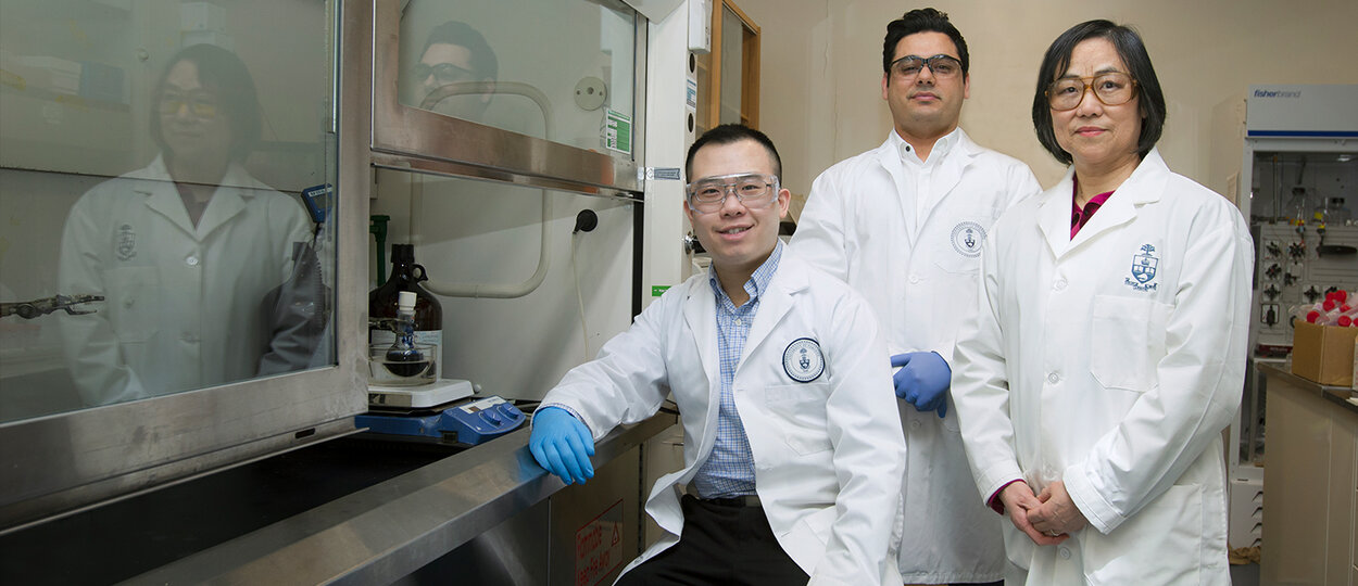 Photo of Brian Lu, Amin Ghavami Nejad and Shirley Wu in lab