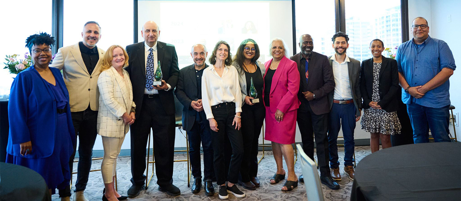 Tarek Hussein (fourth from left) receives Community Builder Award from the Kingston Newcomer Entrepreneur Awards, hosted by the Kingston Economic Development Agenccy 