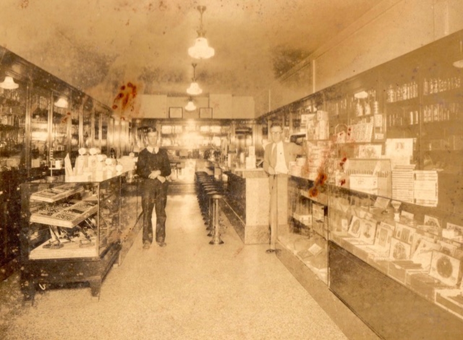 Walter Beattie (right) at Schecter's Pharmacy in Grosse Pointe, Michigan, where he worked.